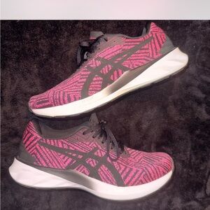 Asics Pink and Black Athletic Shoes with Sleek Design